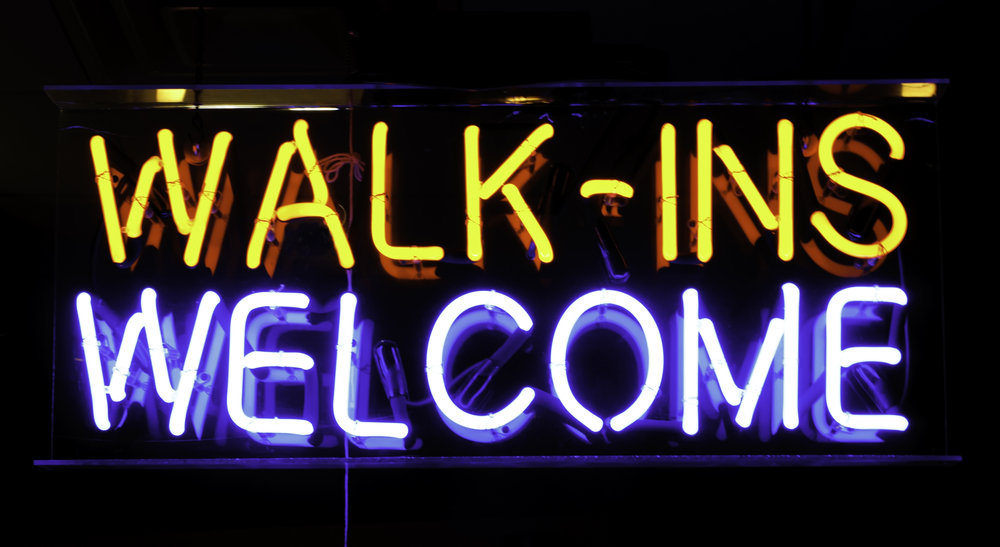 Neon invitation in shop window